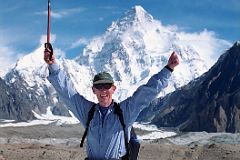 04 Jerome Ryan On Upper Baltoro Glacier With K2 Behind.jpg